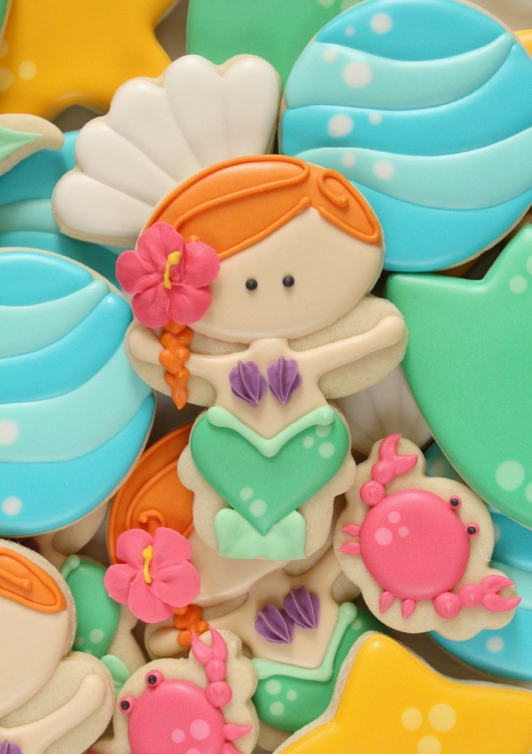 Learn to make mermaid cookies with a Wilton Snowman cutter at Sweetsugarbelle.com