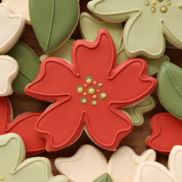 Whimsical Decorated Poinsettia Cookies - The Sweet Adventures of